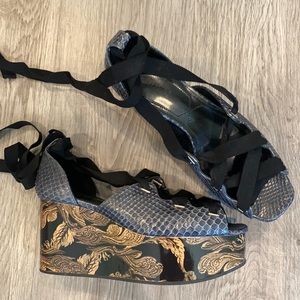 Lace up Asian inspired platform wedges by Erdem with snakeskin detailing